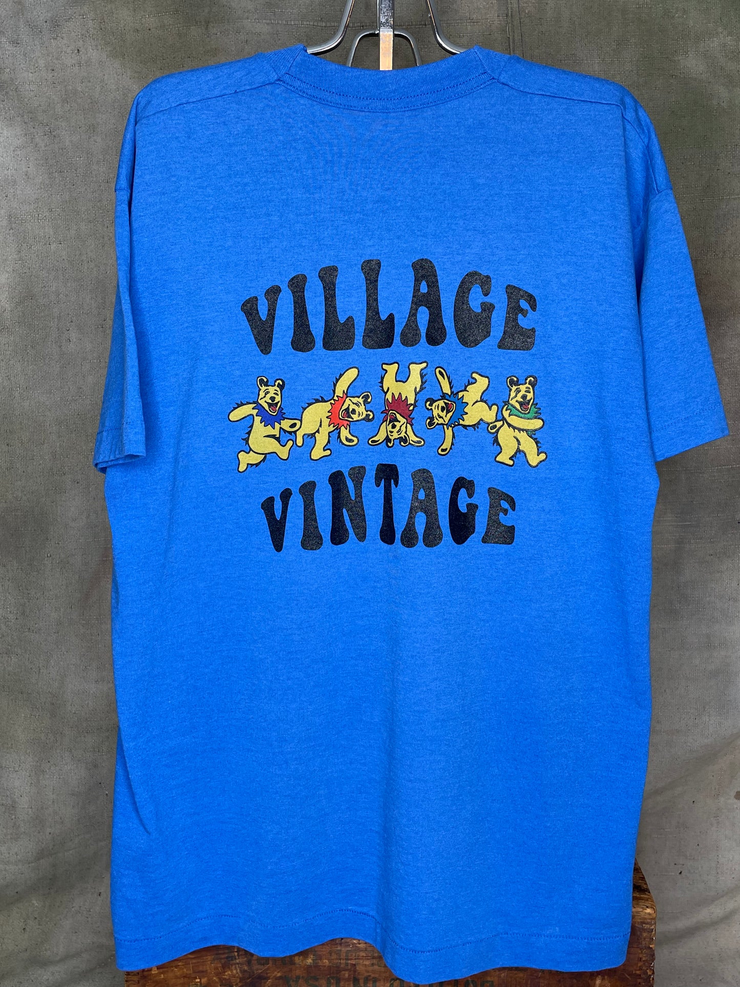Village Vintage Frolicking Bear Logo on Hand Sourced Vintage Blank Shirt L